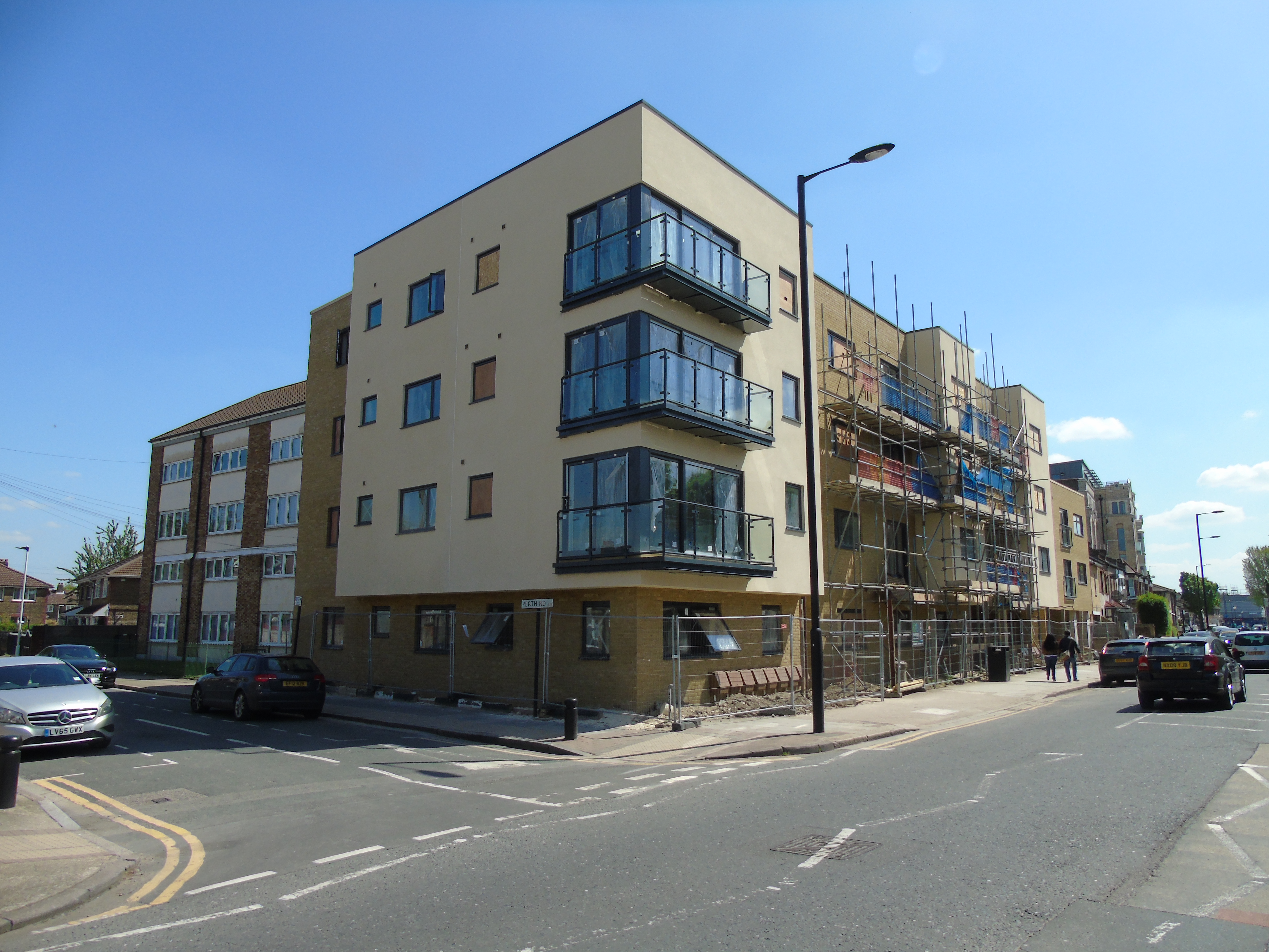 New build block of flats under construction on the former fuel station site