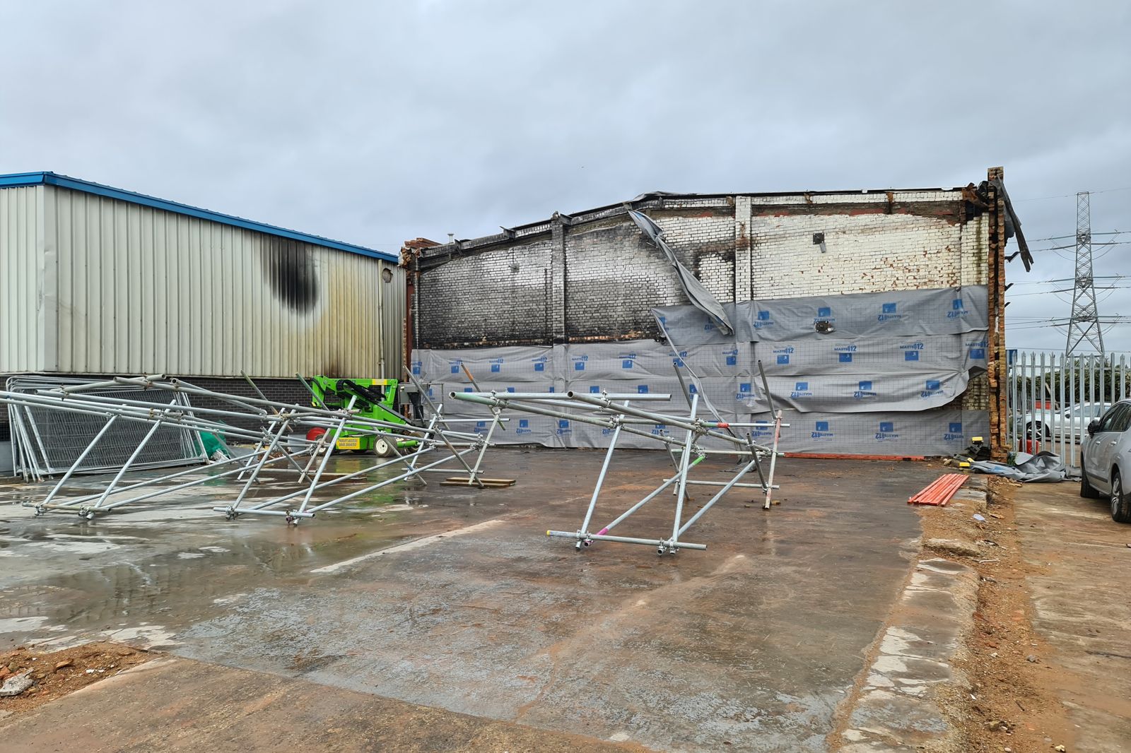 Fire damaged commercial unit on an industrial park ahead of demolition and rebuild