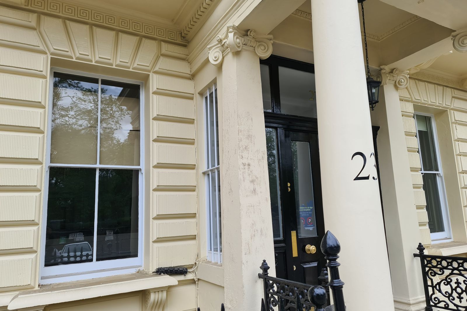 Restored Ionic porch and timber sash windows