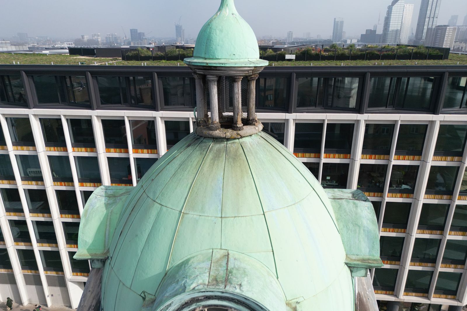 Copper dome and lantern of a Grade II listed tower in Islington, photographed by drone